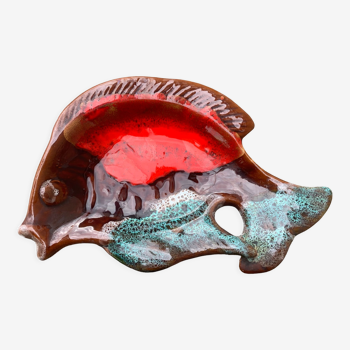 Empty pocket in glazed ceramic slip in the shape of vintage fish