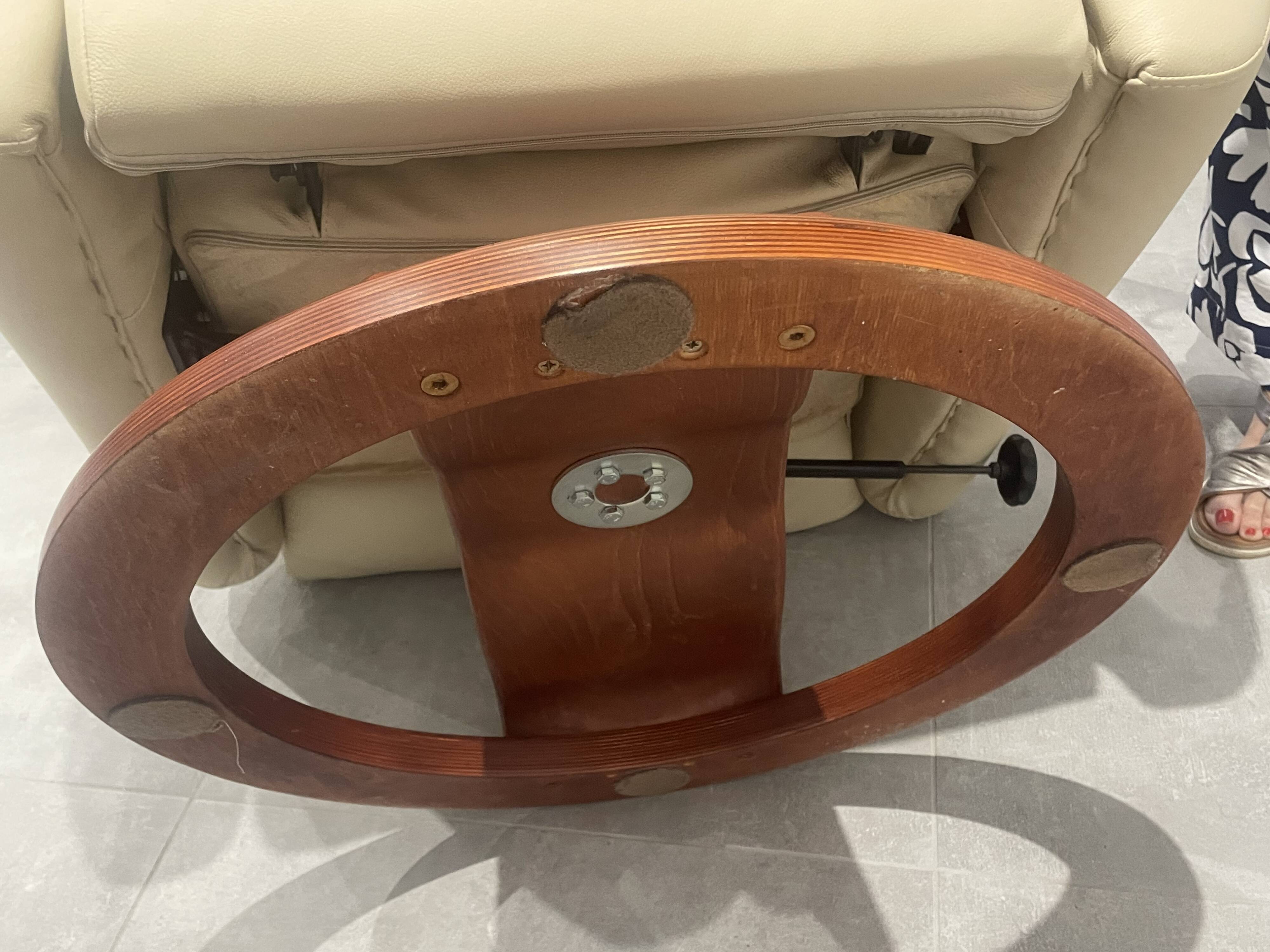 Pair of vintage leather armchairs with ottoman