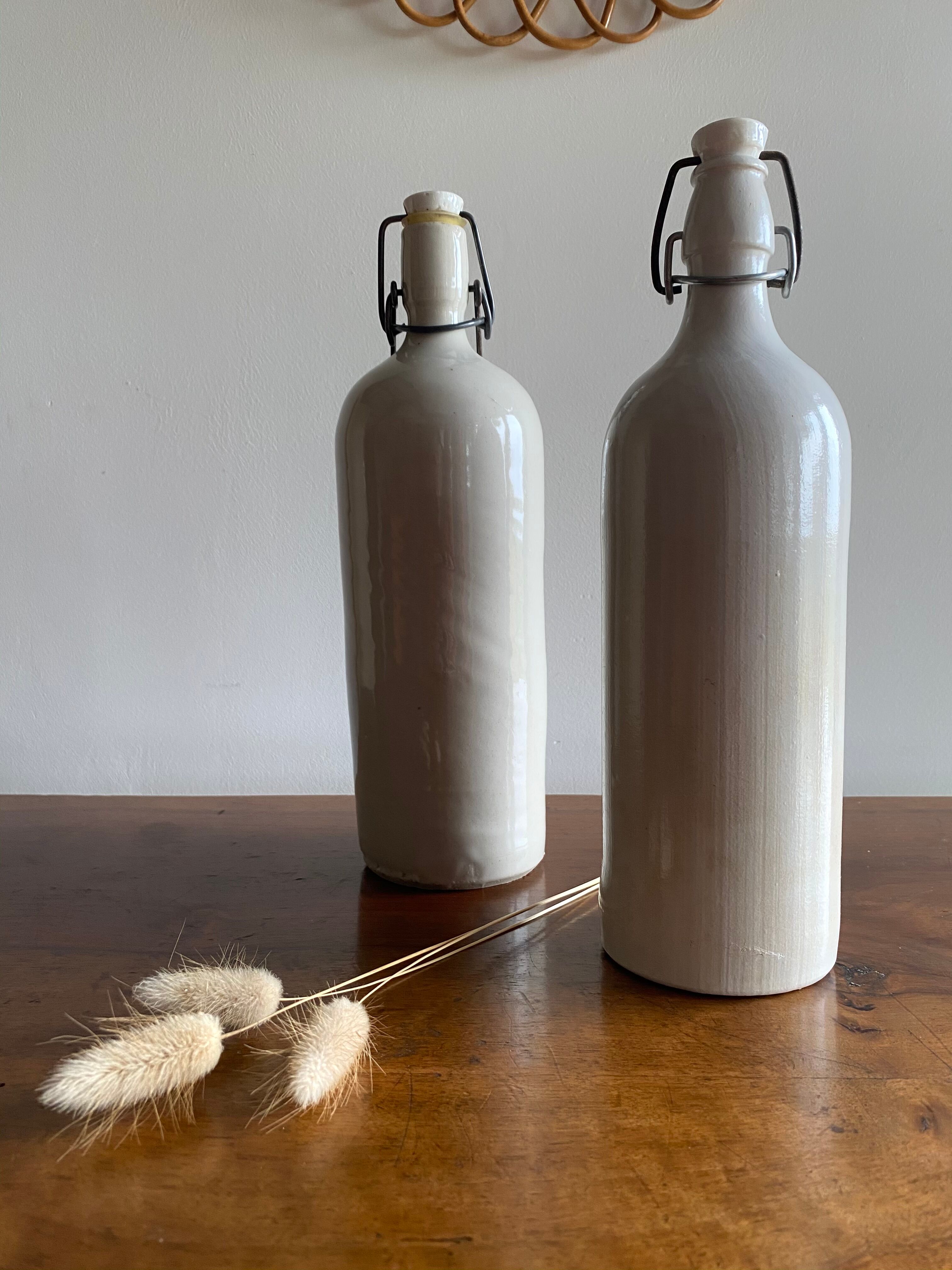 Set of 2 old bottles in glazed stoneware