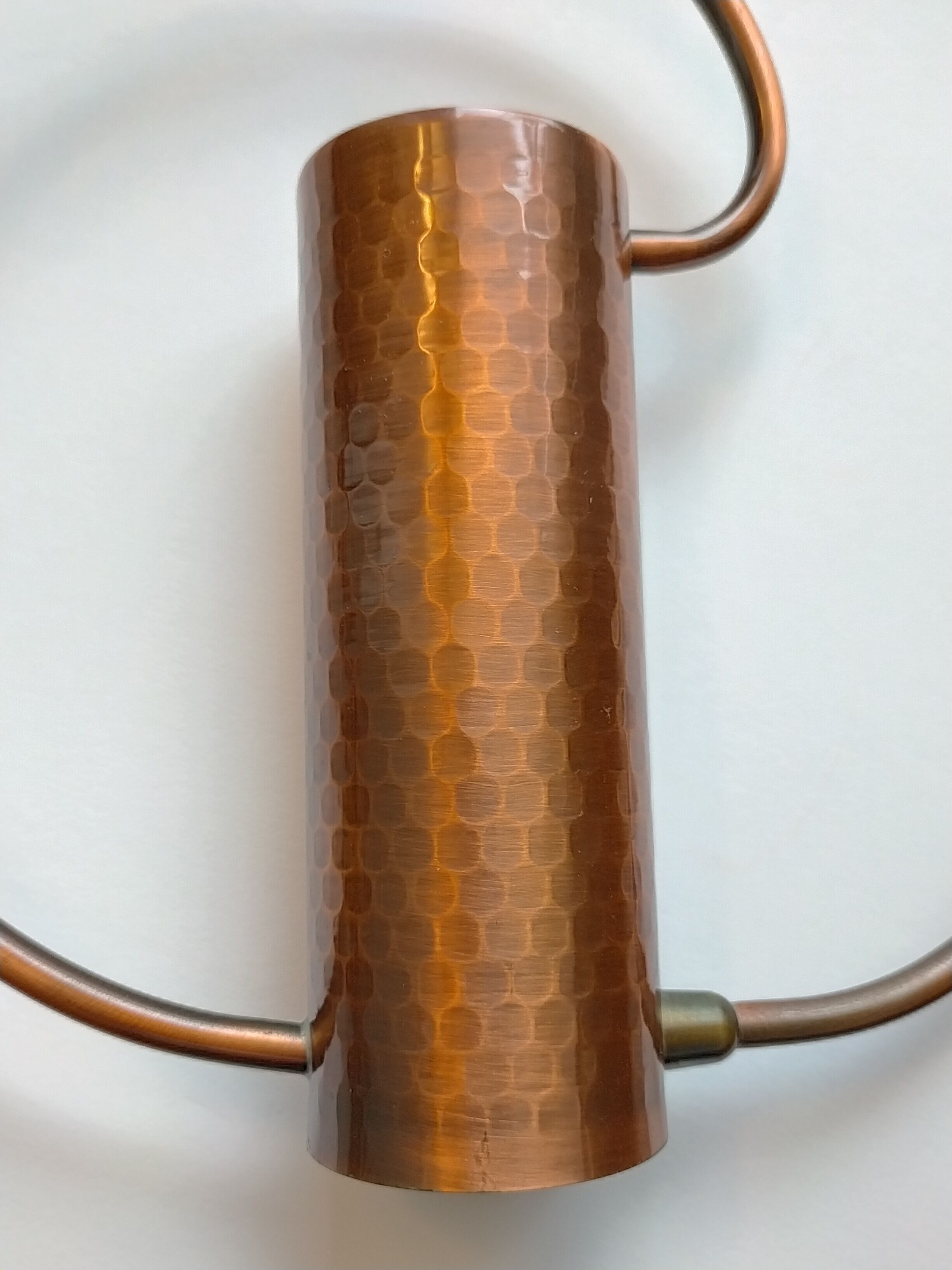 Hammered copper watering can