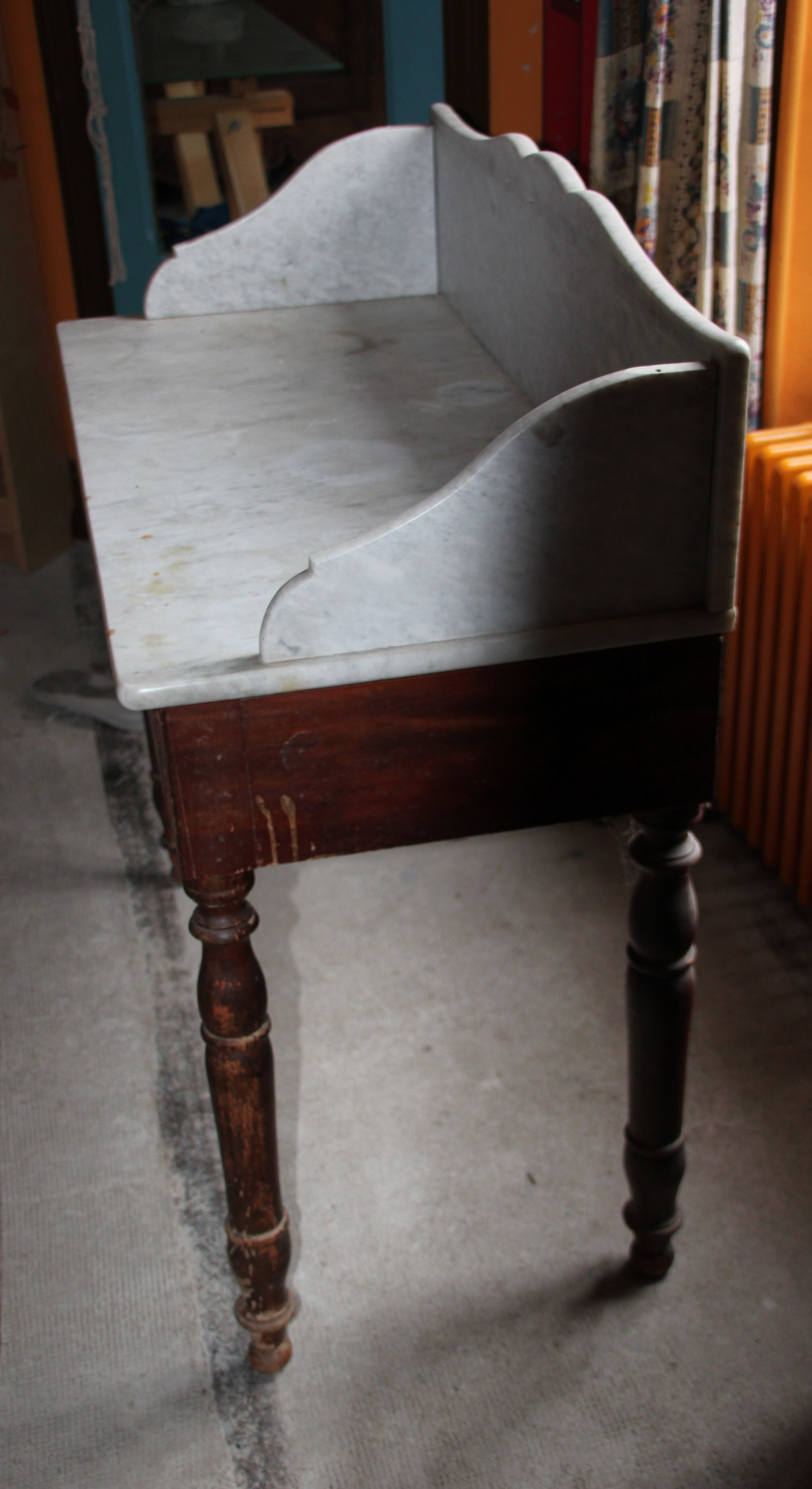 Old wooden and marble toilet table