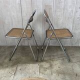 Pair of chrome and cane folding chairs