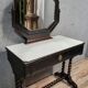 Napoleon III style dressing table in blackened wood, featuring an elegant octagonal mirror