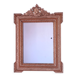 Miroir Napoléon III a riche ornementation dorée