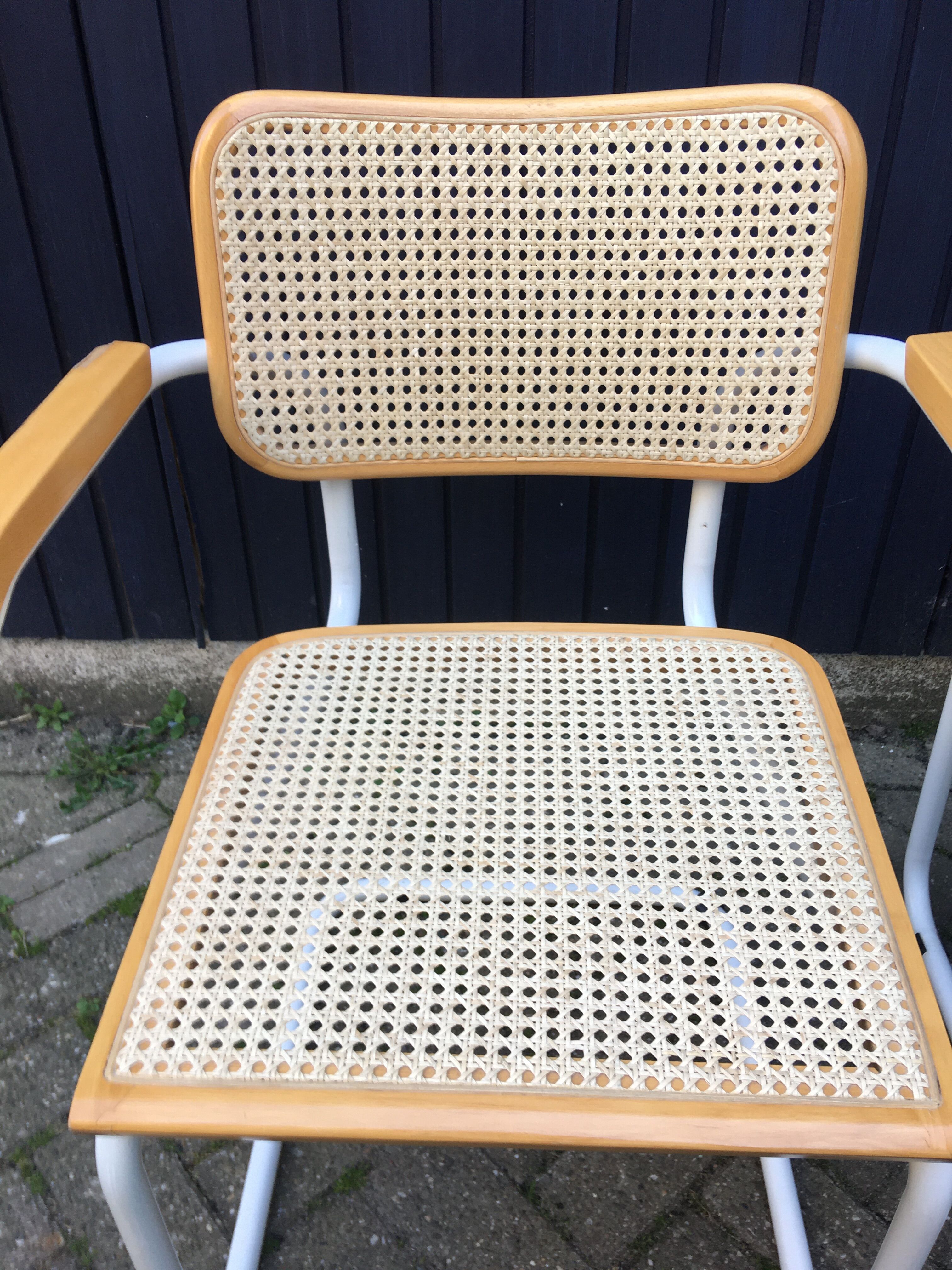 Marcel Breuer's white S64 armchairs