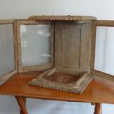 18th century showcase has three mobile windows