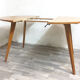 Table ronde pieds compas, 1960