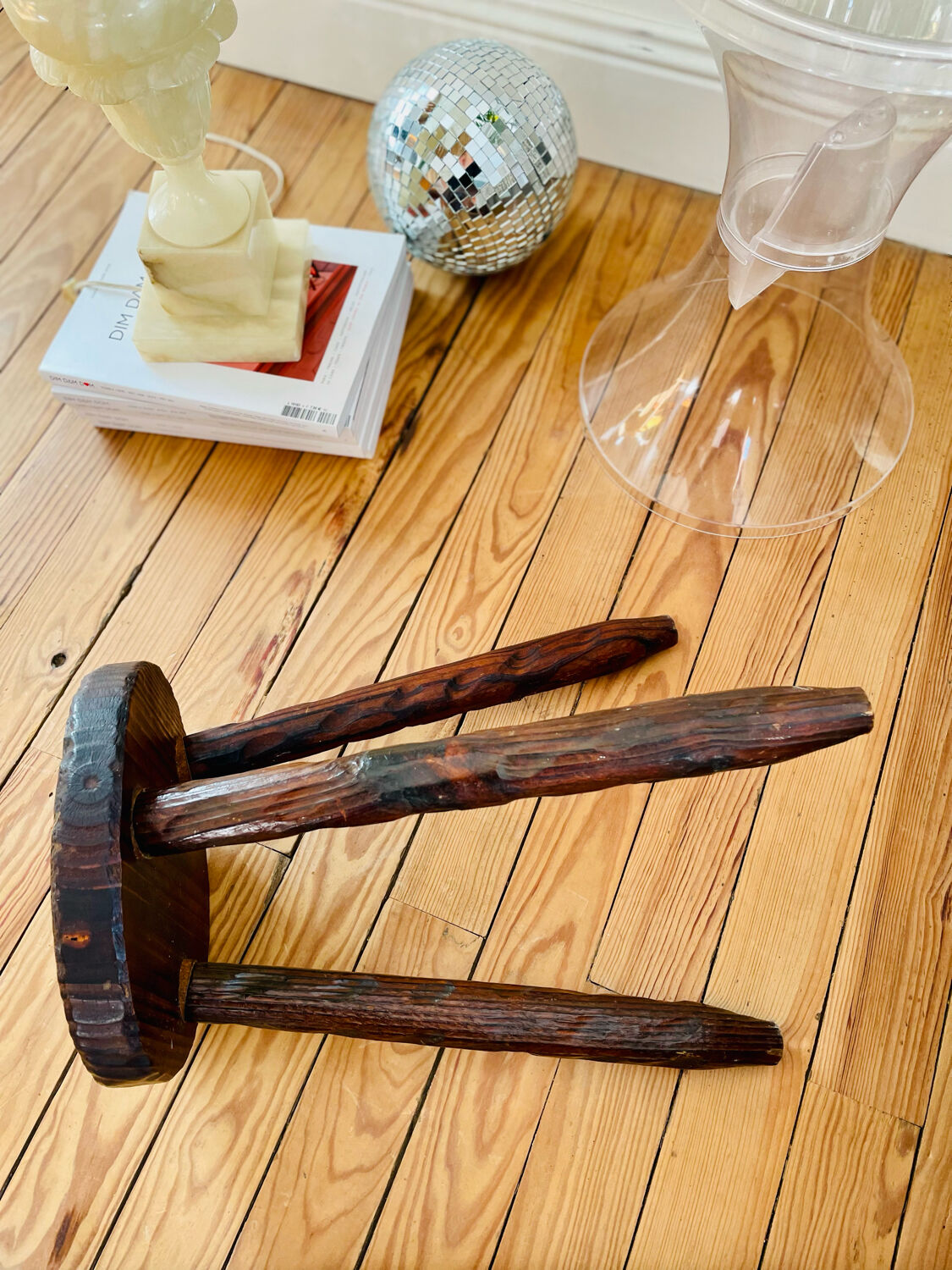 Dark wood tripod stool