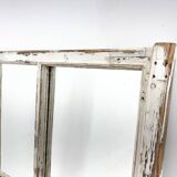 Vintage wooden window converted to a mirror