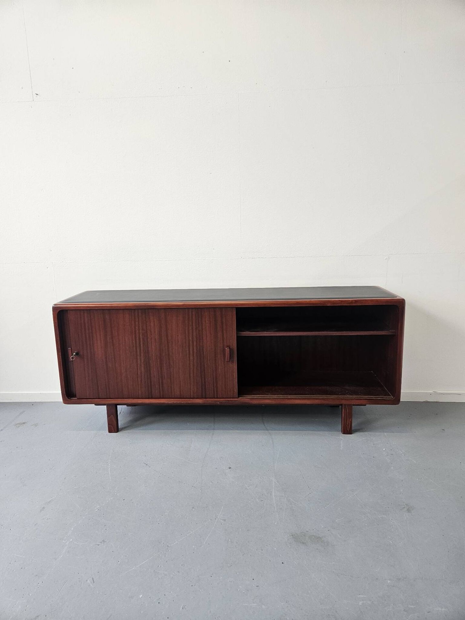 Vintage enfilade in teak and leather, 1970s.