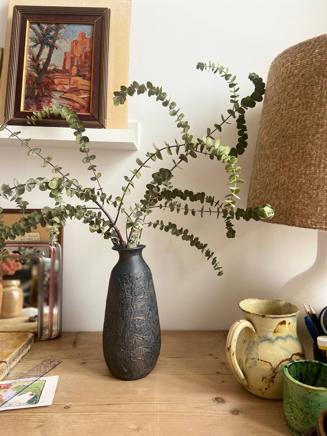 Black ceramic pitcher from the 50s