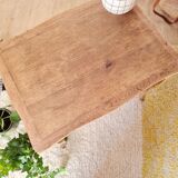 Antique coffee table with curved legs.