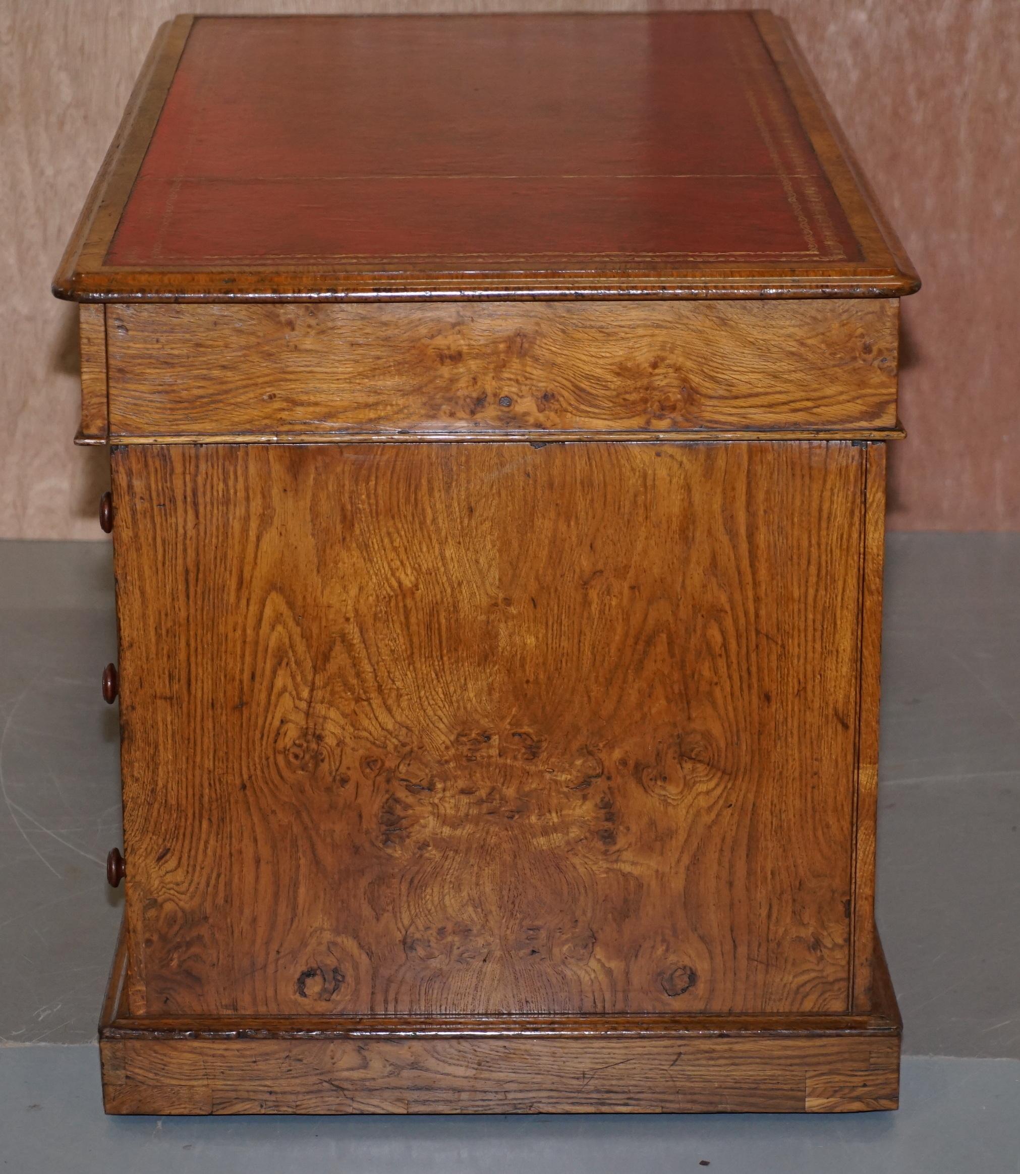 Rare oak partner's desk by Howard & Sons circa 1880 with leather.