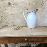 Enamelled sheet metal broc