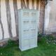 Parisian style display cabinet with 2 doors and 3 shelves in Luxembourg green.