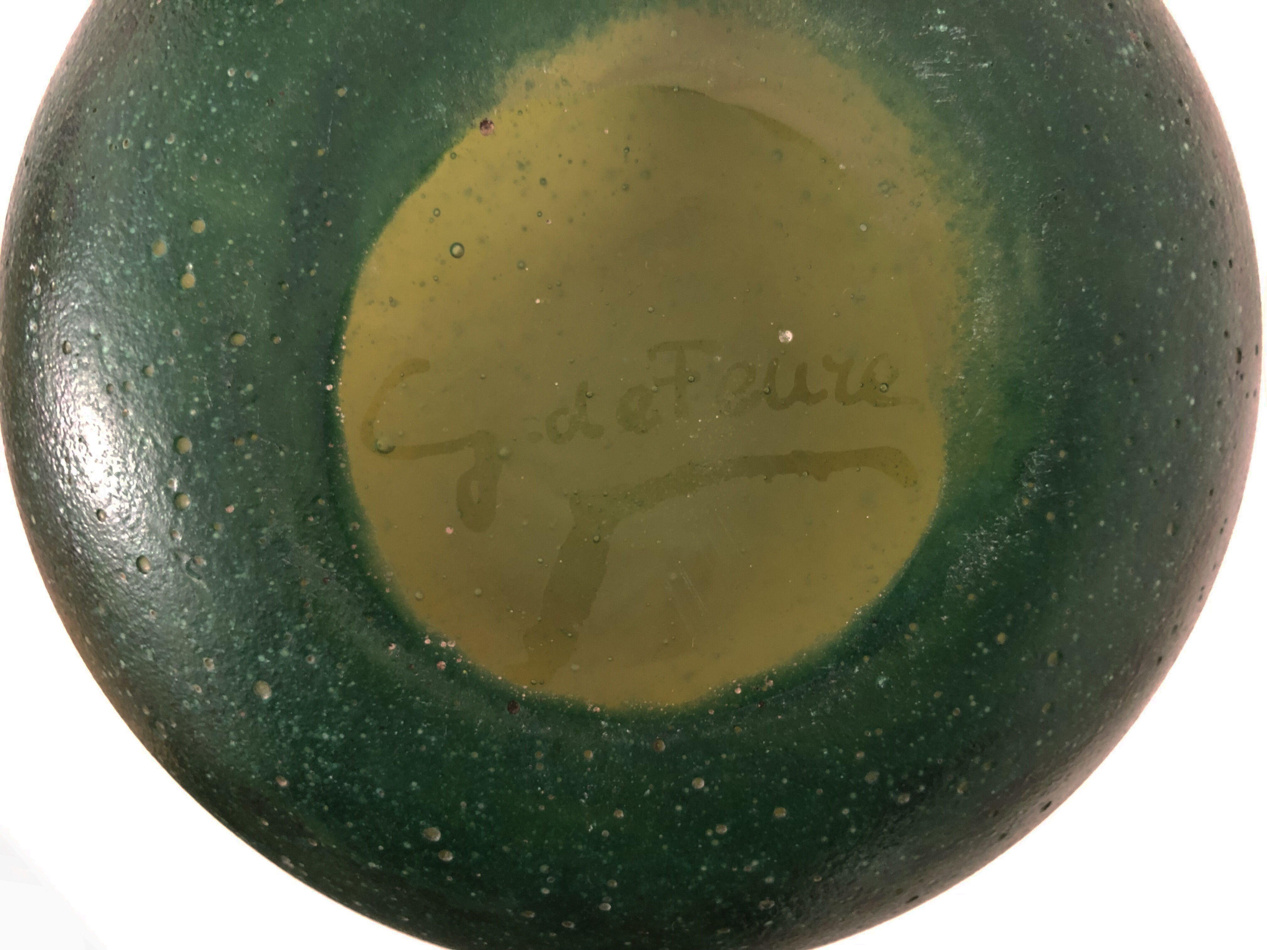 Pitcher in orange and green marble glass paste. Signed Georges De Feure for Daum