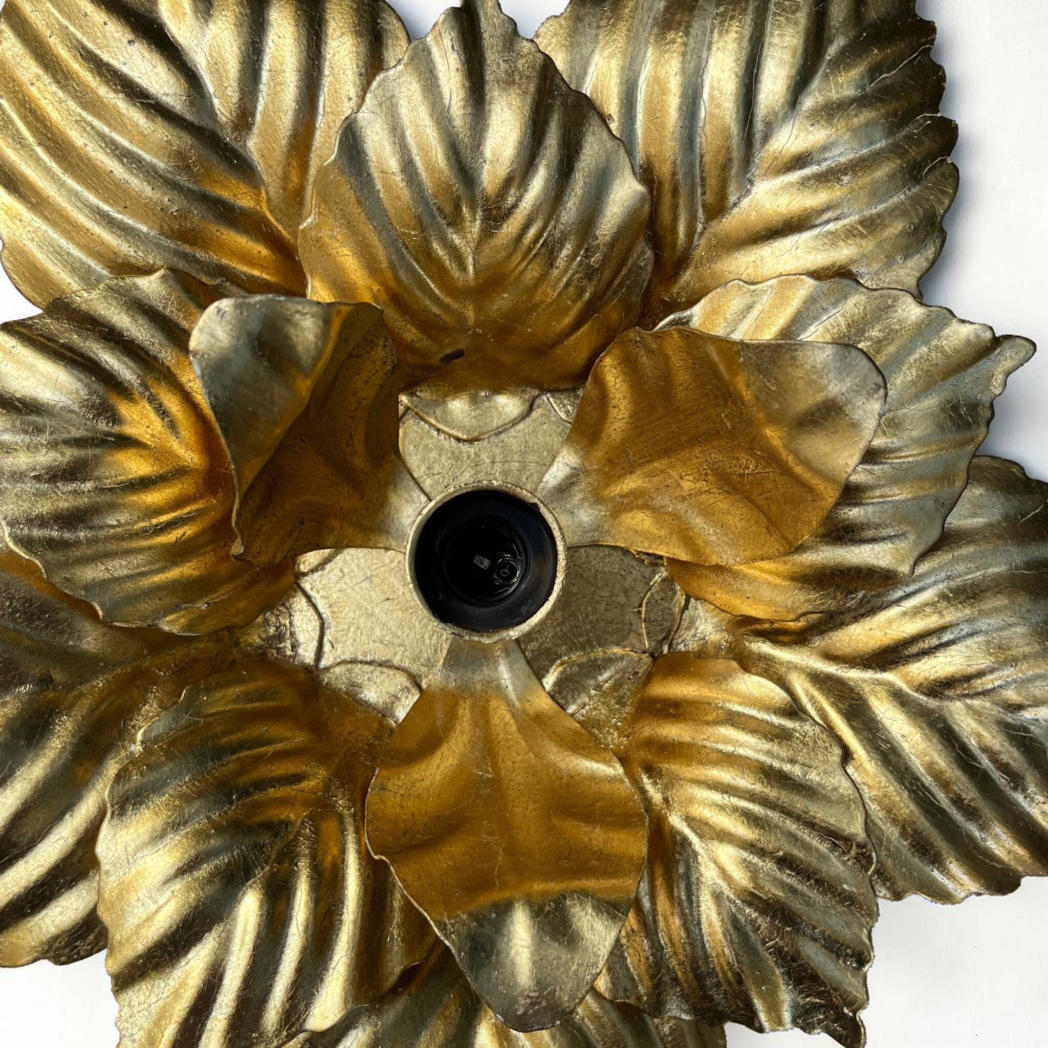 Vintage 1970s - 80s gold leaf metal flower wall light.
