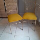 Pair of vintage golden designer chairs from the 50s