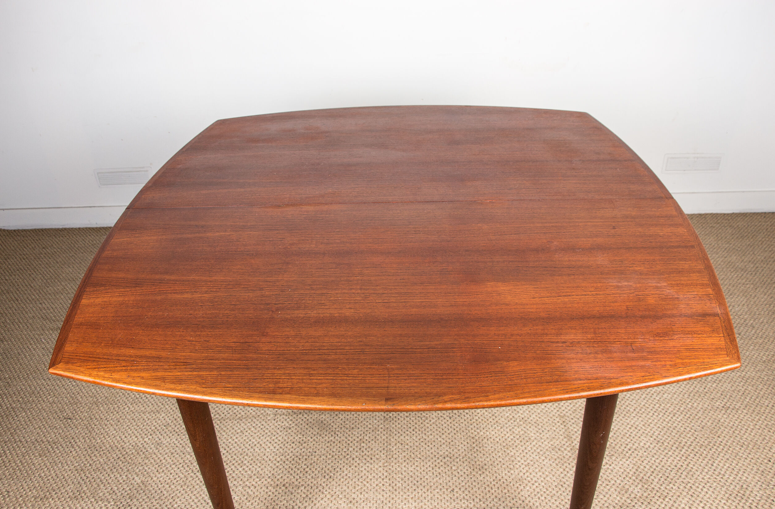 Expandable square teak dining table by Henry Walter Klein 1960