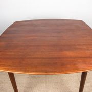 Expandable square teak dining table by Henry Walter Klein 1960