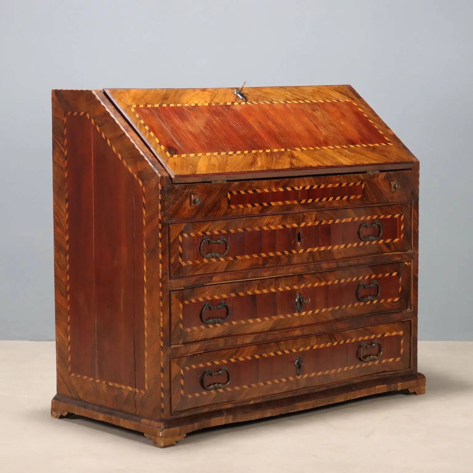 Antique drop-leaf cabinet in various types of wood, Italy, 18th century.