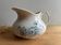Old jug / pitcher with Daisy pattern from La Faïencerie Nouvelle in Givors.