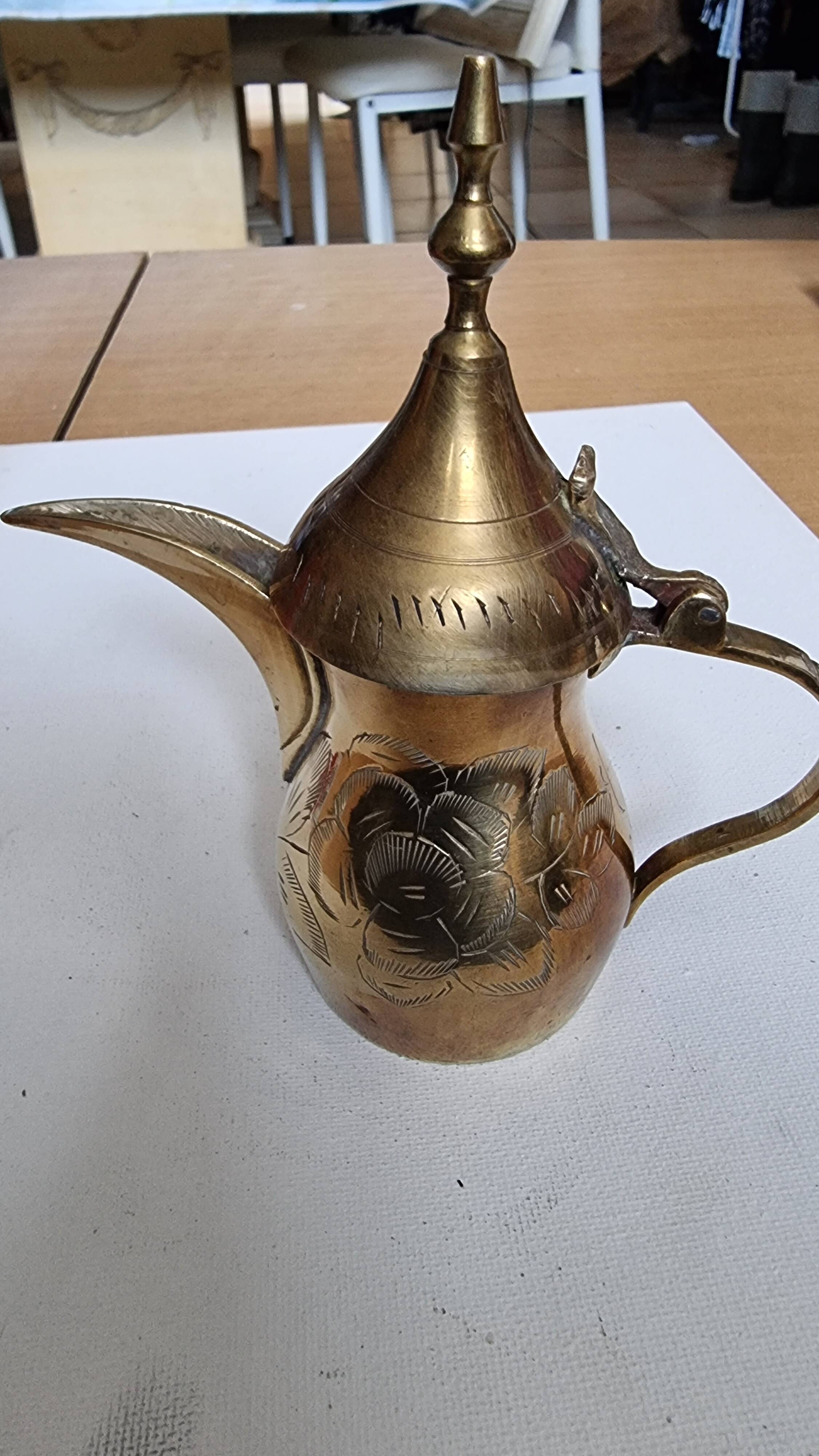 Small carved brass pourer