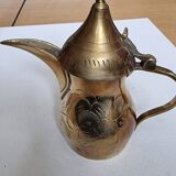 Small carved brass pourer