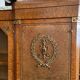 Showcase library in Neoclassical style, 1930, walnut burl and bronze.