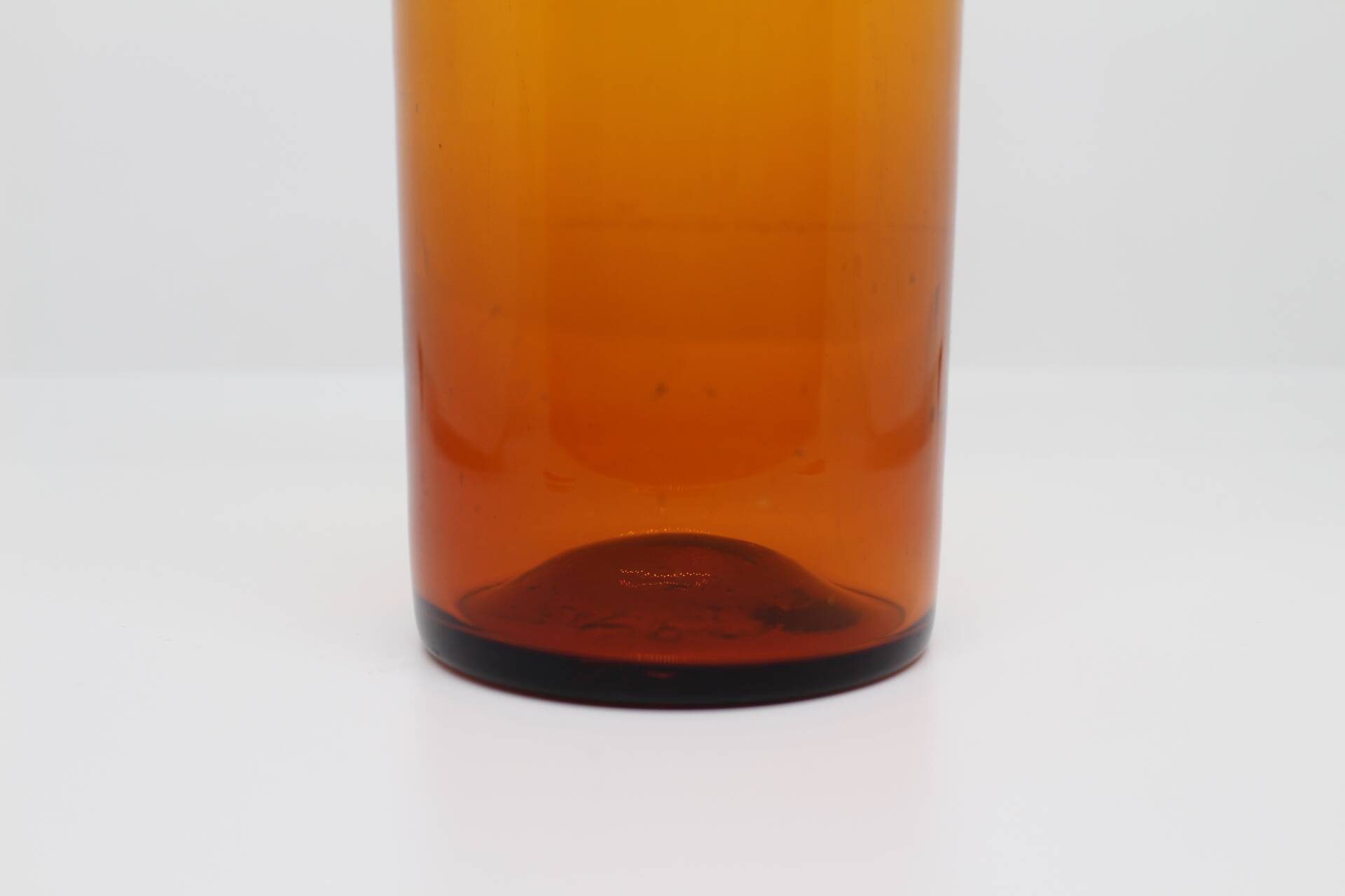 Flacon ambré en verre soufflé