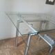 High table with tempered glass and chrome base.