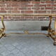 Travertine coffee table, golden foot