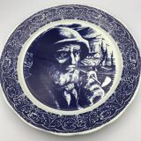 Blue enamelled earthenware wall plate with fisherman decor, Boch La Louvière, Belgium