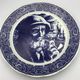 Blue enamelled earthenware wall plate with fisherman decor, Boch La Louvière, Belgium
