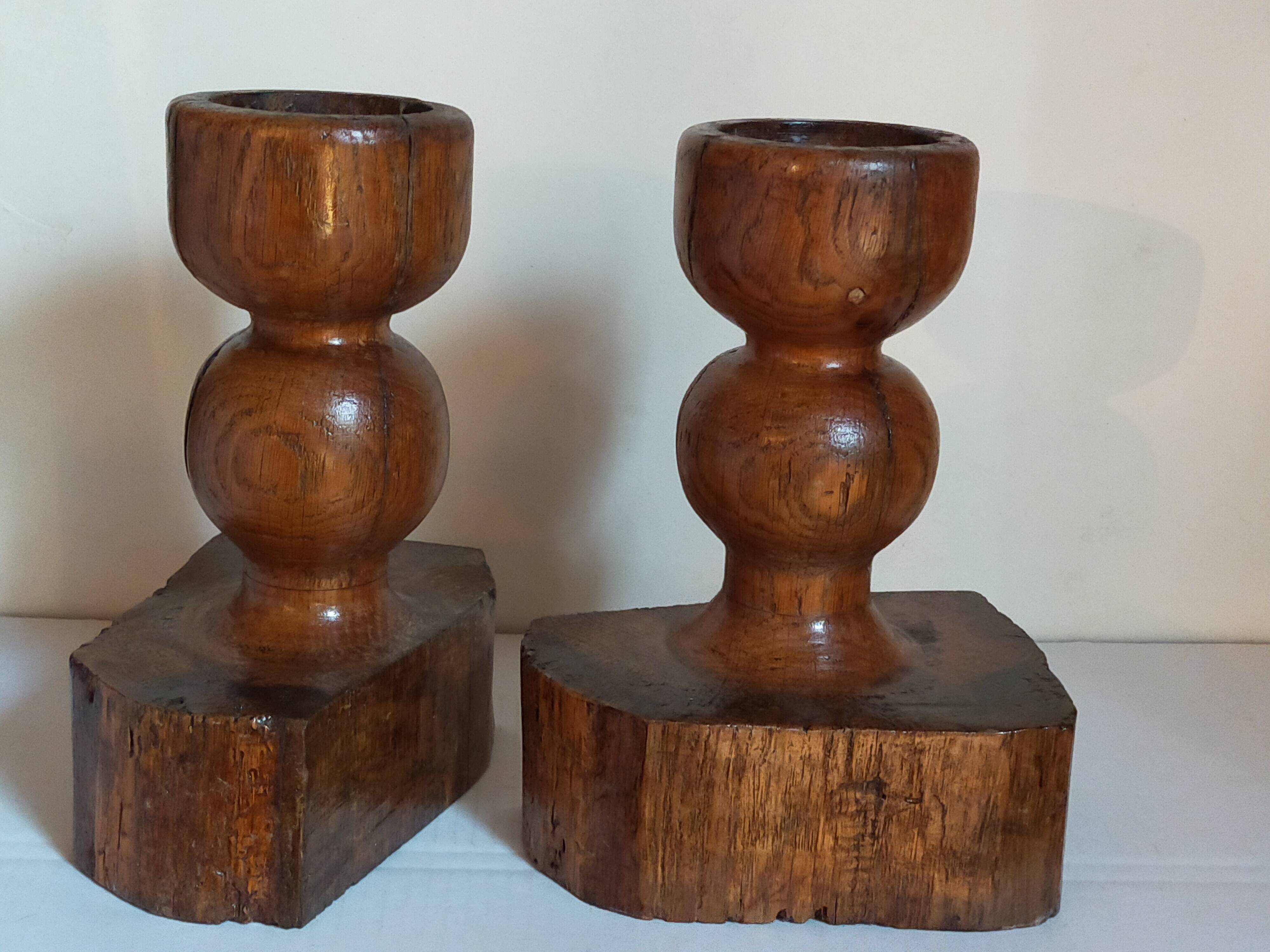 Pair of old brutalist turned solid wood candlesticks