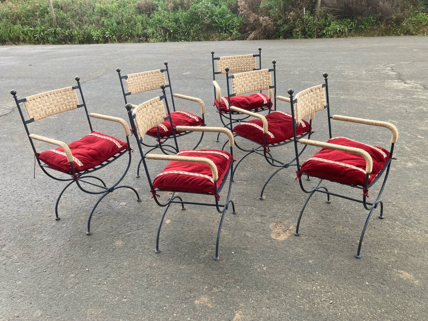 Six. Wrought iron armchairs, rope weaving.