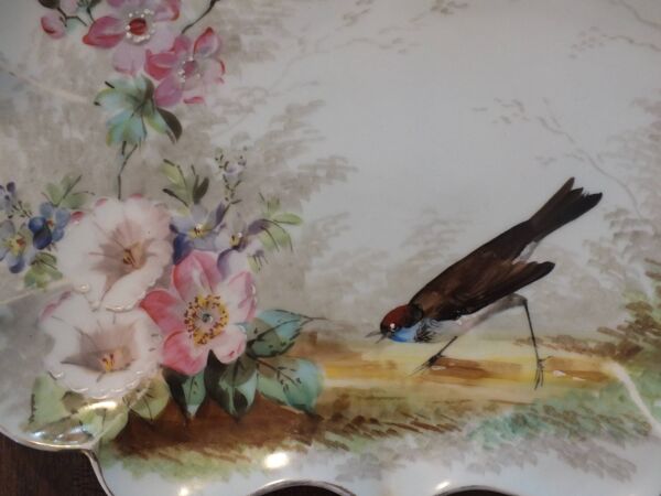 Paire de petits plats en porcelaine peinte oiseaux et fleurs 19è