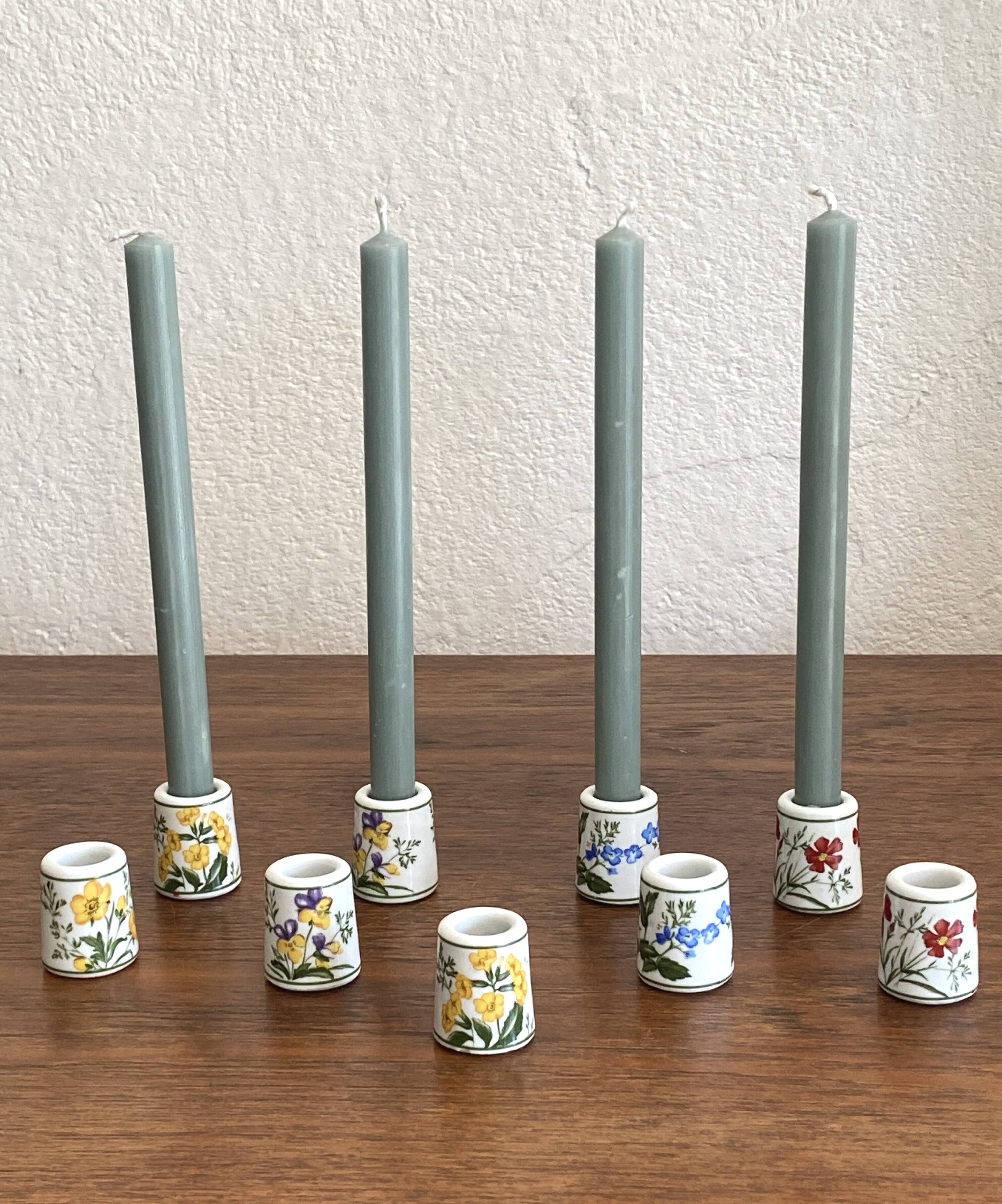 Set of 9 mini vintage porcelain candle holders decorated with spring flowers.