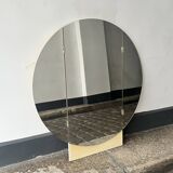 Large round triptych mirror with ivory background and back, 1970s design.