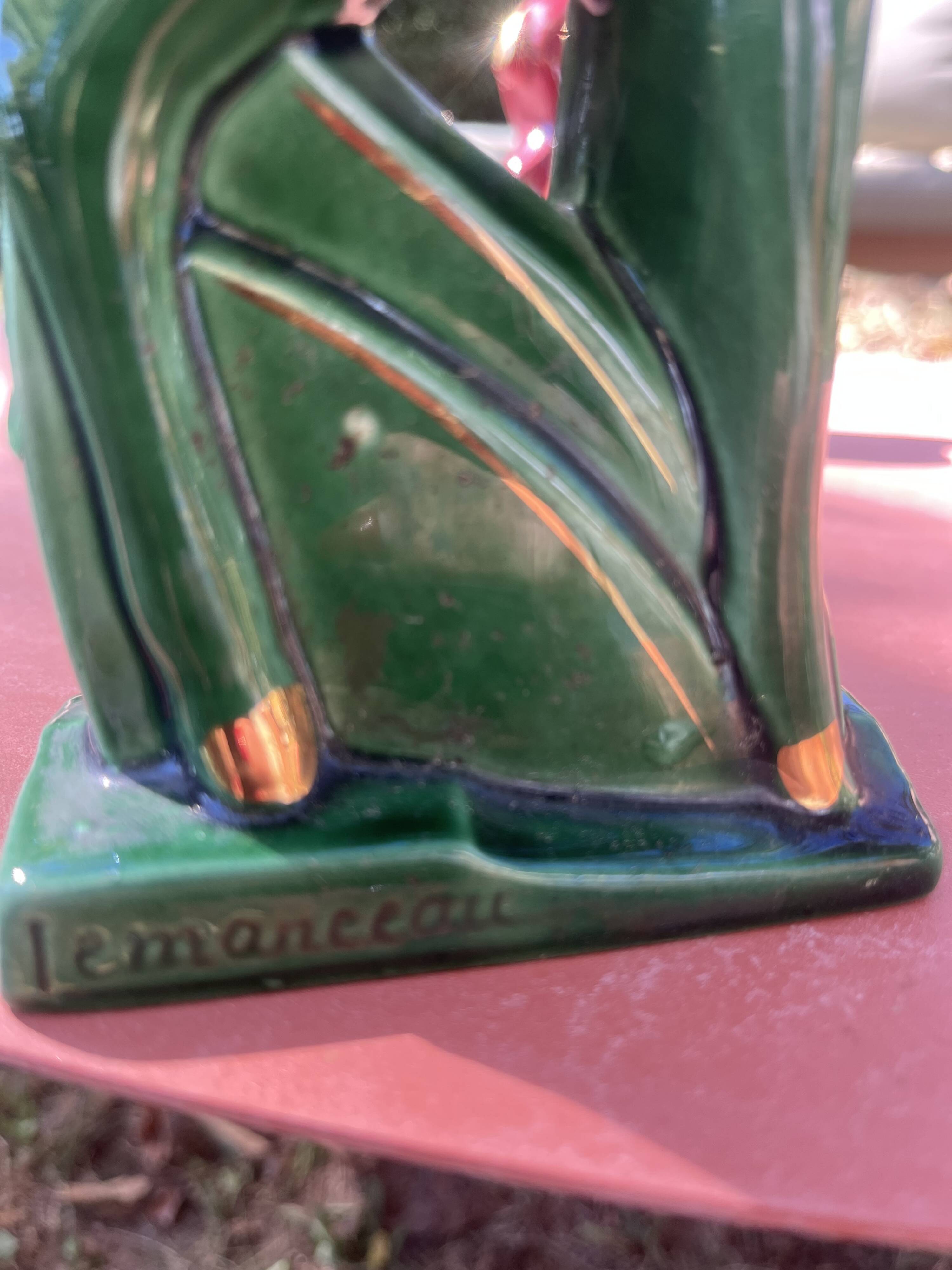 Pair of Art Deco deer by Charles Lemanceau in red and green ceramic.
