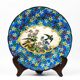 Assiette Longwy début XXe  – Émaux cloisonnés à décor d’oiseaux et fleurs