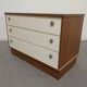 Low chest of drawers with 3 drawers in mahogany and white satin, France circa 1980.