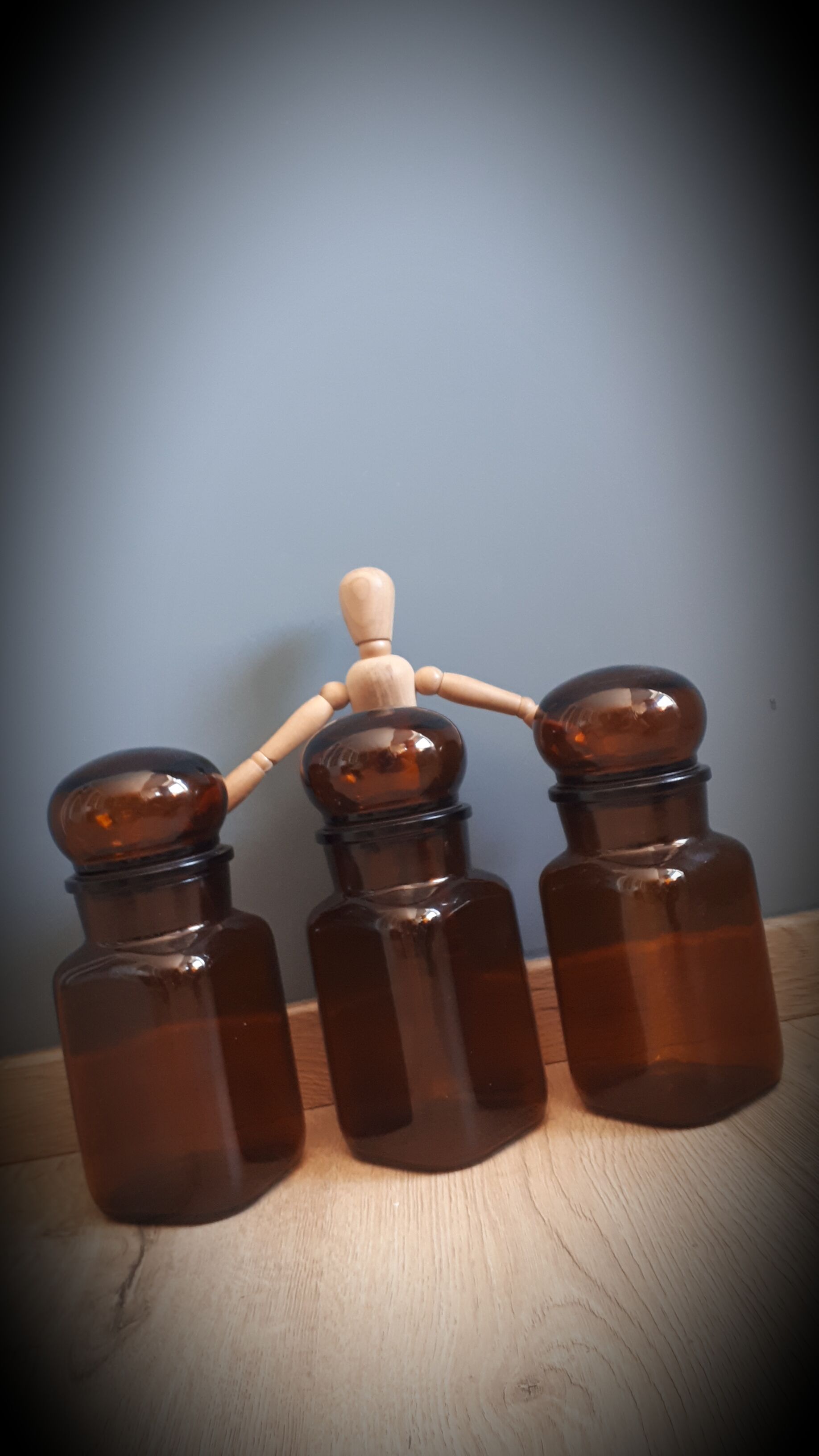 Trio round brown apothecary bottles