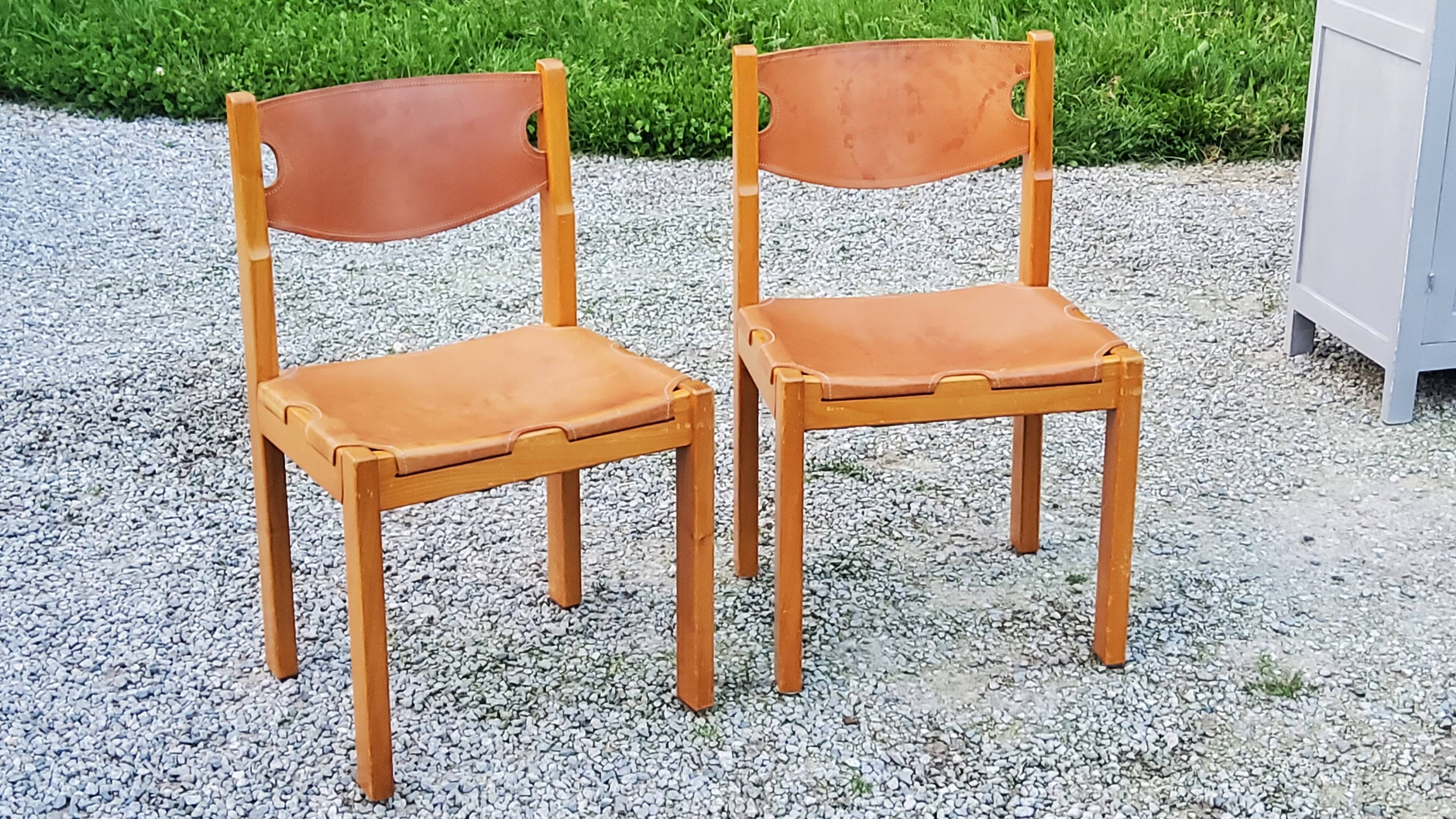 Pair of brutalist chairs in elm and stretched leather with saddle stitching Self publisher