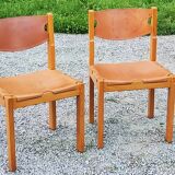 Pair of brutalist chairs in elm and stretched leather with saddle stitching Self publisher