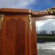 Three-door wardrobe with marquetry and bronze.