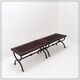 Set of 2 solid wood benches with an openwork design and wrought iron legs.