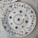 Set of 2 flat plates in English earthenware with blue floral decoration.