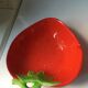 Strawberry-shaped pitcher with a dish