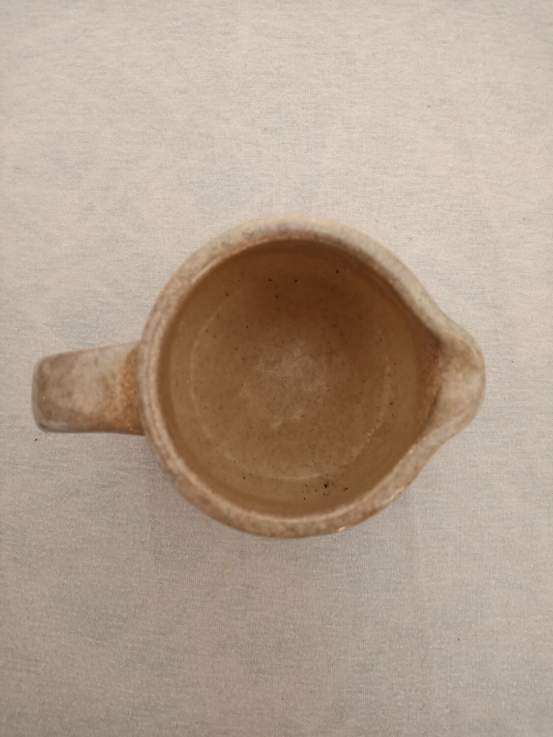 Signed stoneware milk jug